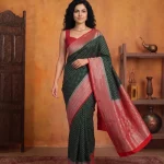 Georgette Banarasi Dark Green Saree with Silver Butti Motifs and Coral Pink Border