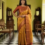 Kanjivaram Pure silk Mustard Gold Self-Design Saree with Copper Zari Border